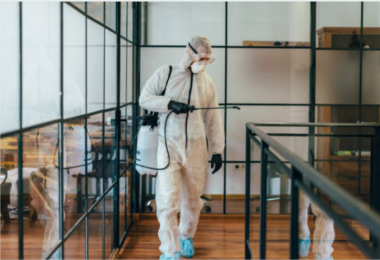 man cleaning office